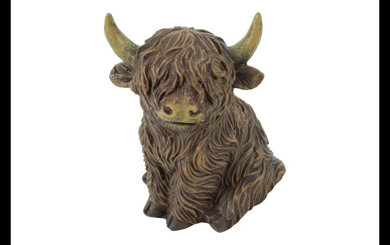 Schotse hooglander zittend Walker S bruin